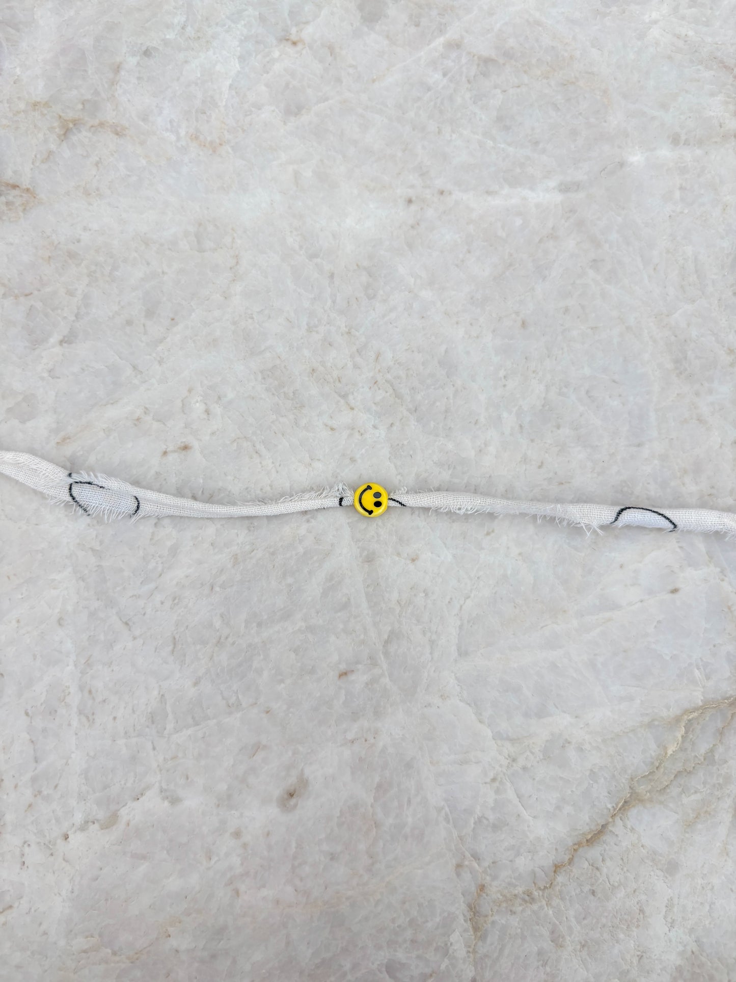 Smiley armband - wit