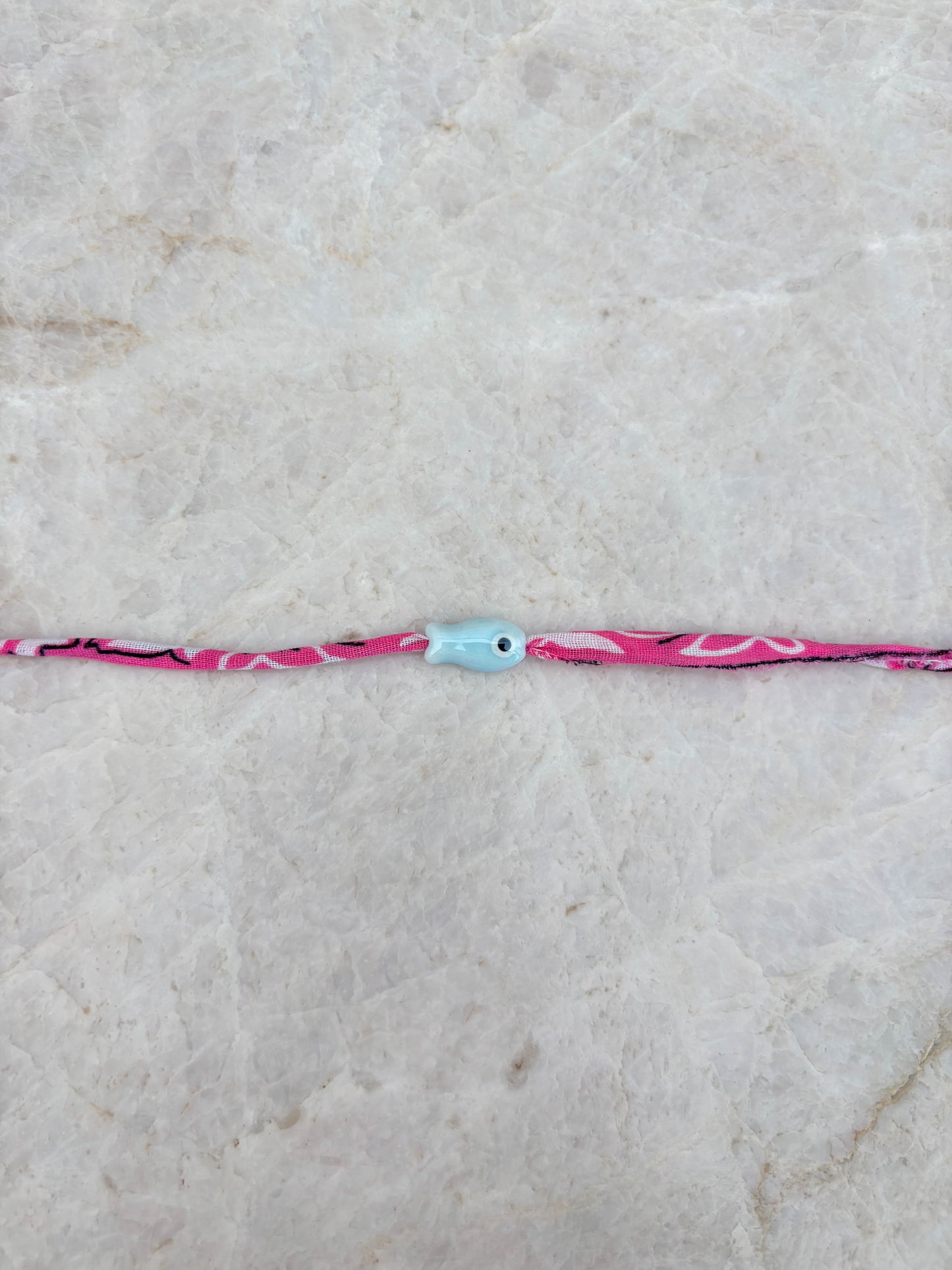 Vis armband - lichtblauw/roze