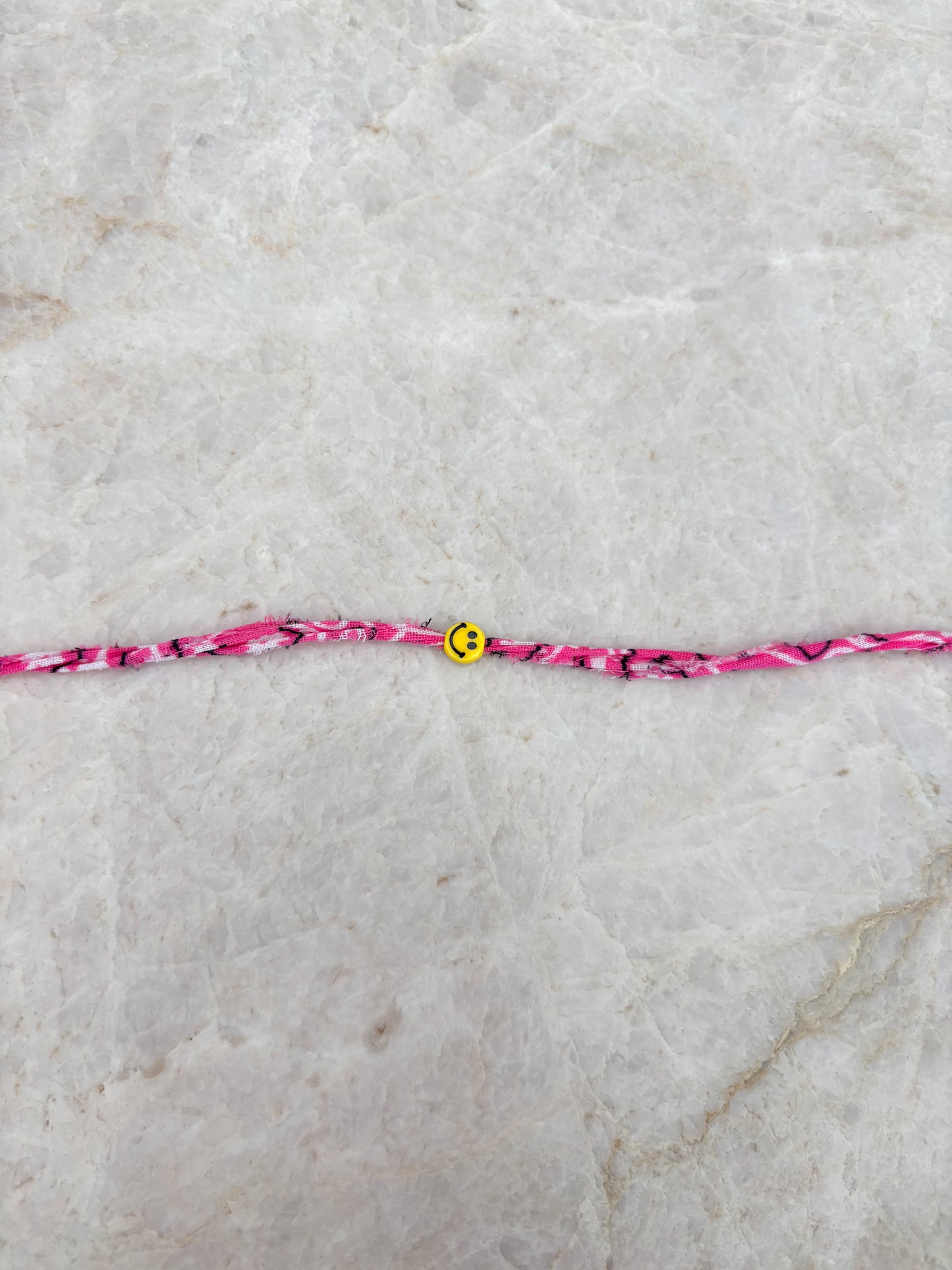 Smiley armband - roze