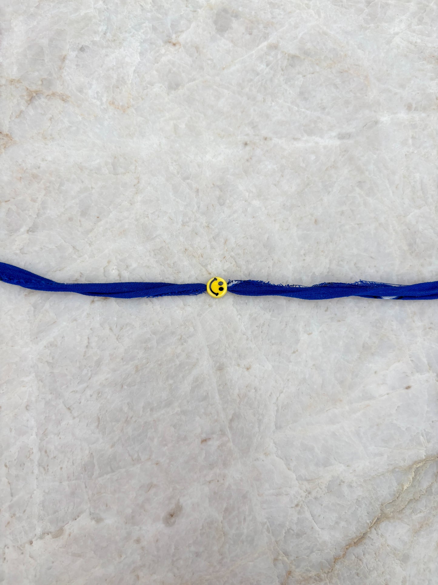Smiley armband - blauw