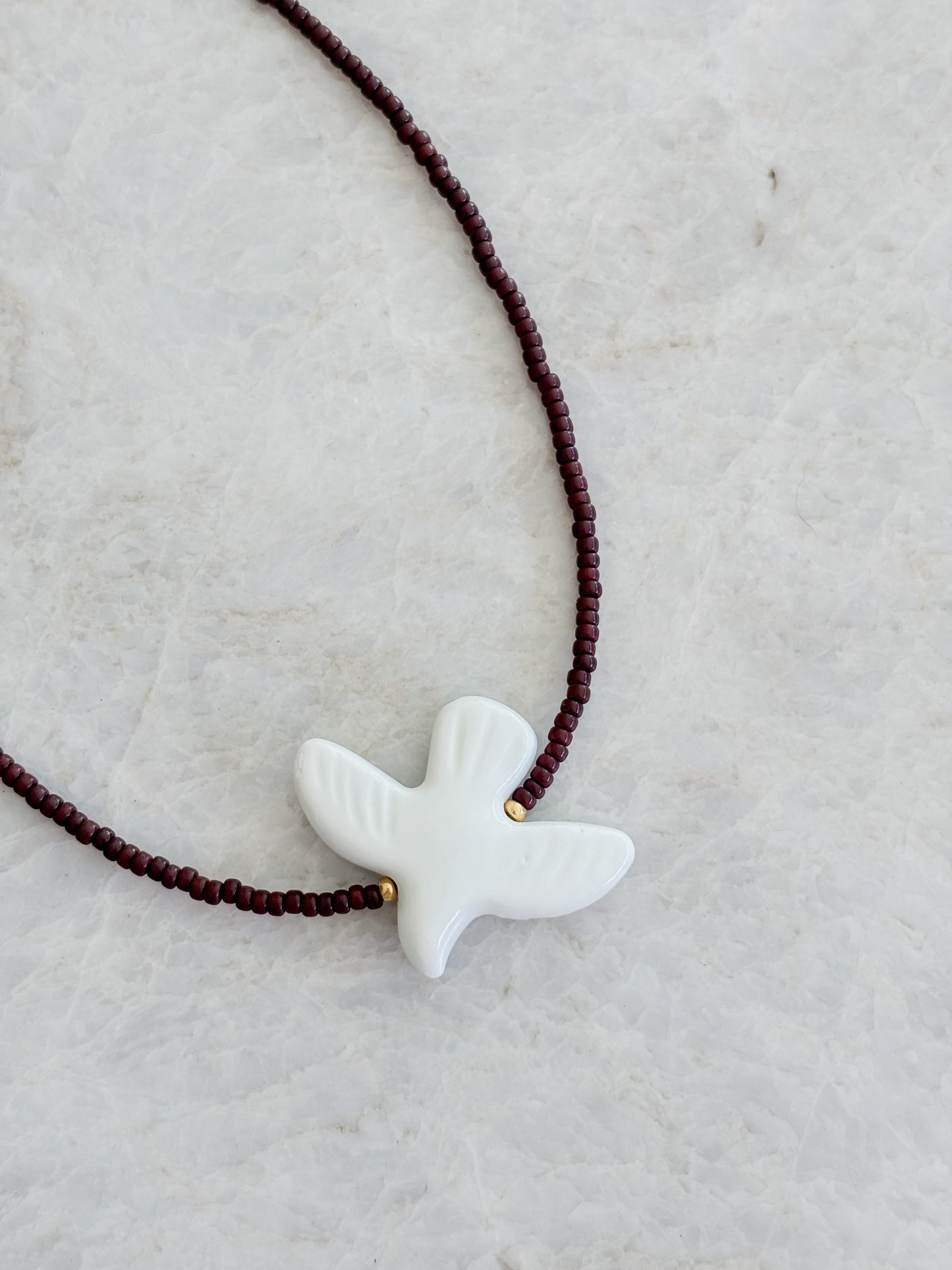 Bird necklace - brown