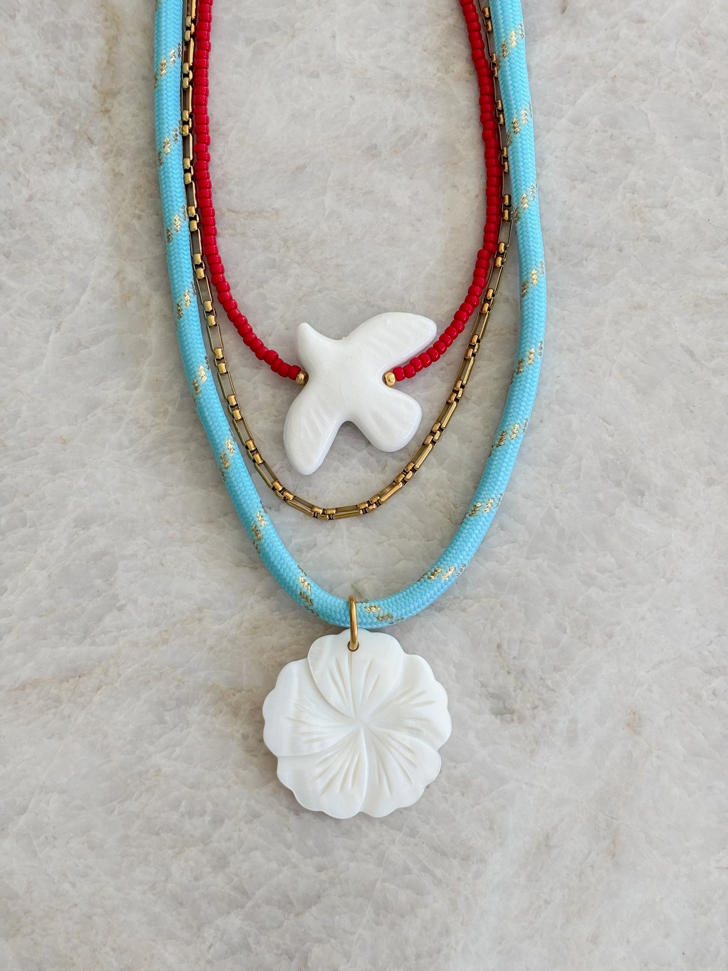 Flower surf cord necklace - blue