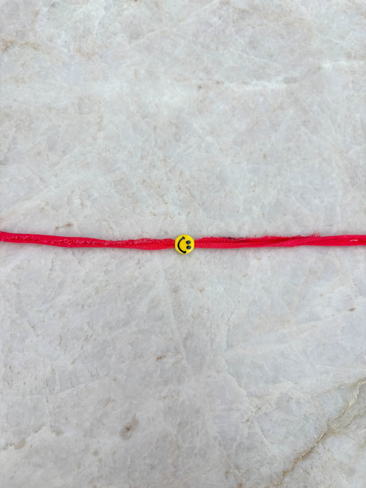 Smiley armband - koraal