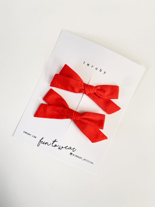 Bows coral red